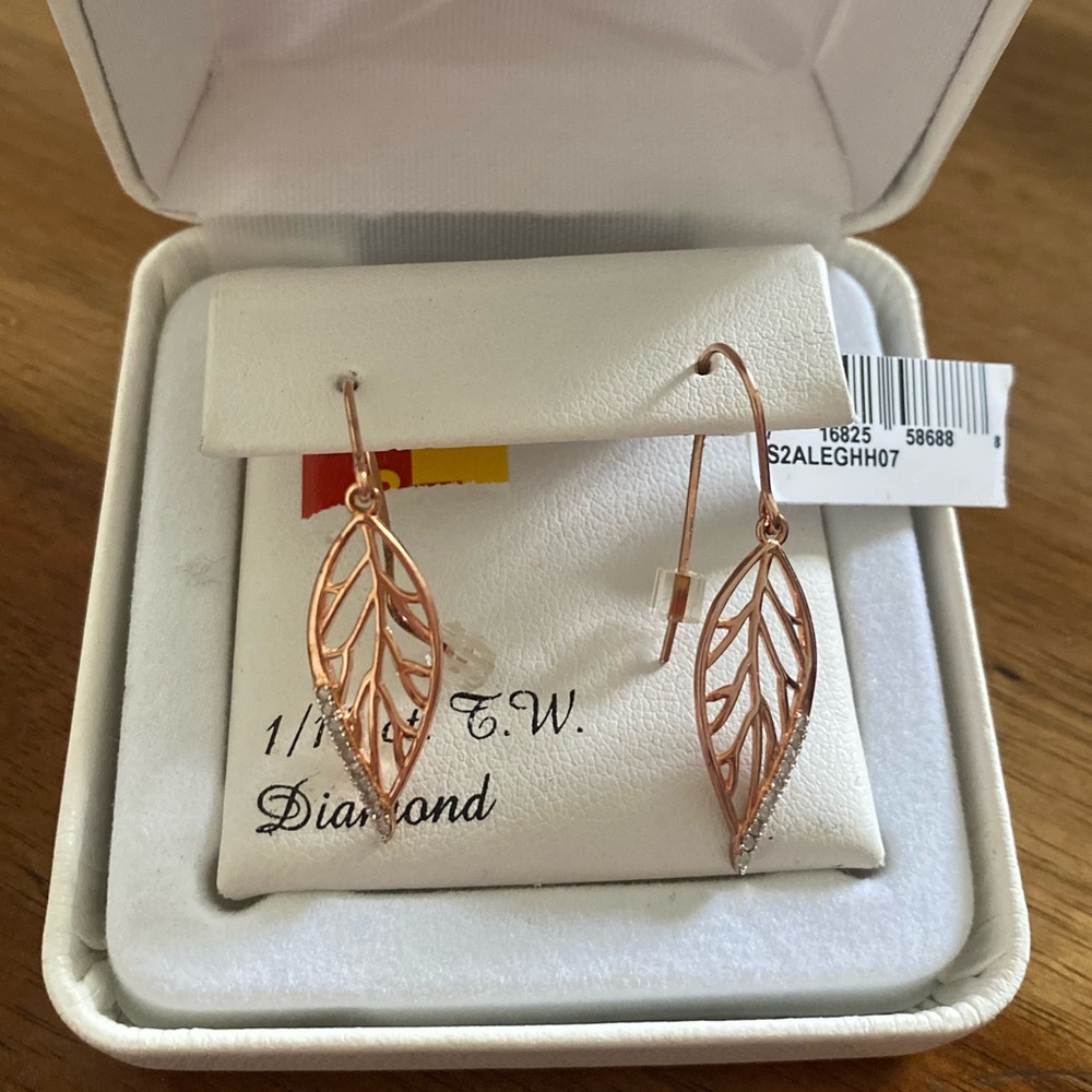 14K Rose Gold covered Sterling Silver earrings with 1/10 diamonds.